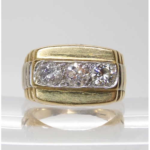 629 - A 9ct gold gents three stone diamond ring set with estimated approx 1.50cts of brilliant cut diamond... 