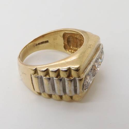 629 - A 9ct gold gents three stone diamond ring set with estimated approx 1.50cts of brilliant cut diamond... 