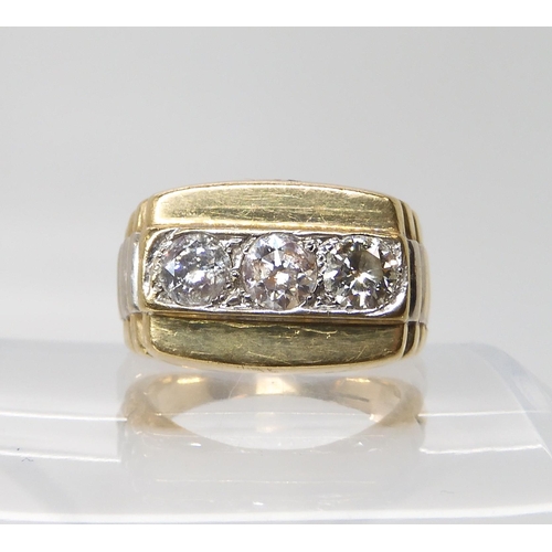 629 - A 9ct gold gents three stone diamond ring set with estimated approx 1.50cts of brilliant cut diamond... 