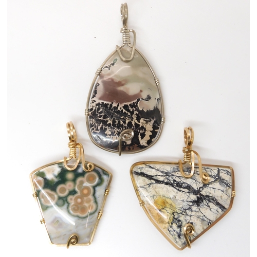 639 - Three American silver and gold plated wire wrapped mineral pendants to include marine jasper, and tw... 