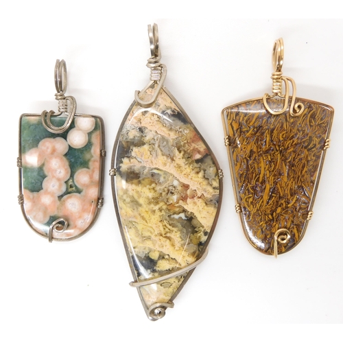 641 - Three American silver and gold plated wire wrapped mineral pendants to include marine jasper, and tw... 