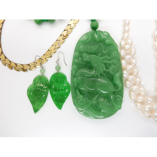 650 - Chinese green hardstone pendant and earrings, cultured pearls and other items in a mother of pearl b... 