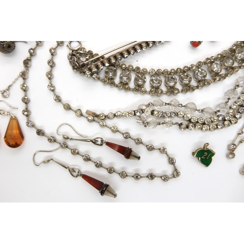 655 - A collection of silver and costume jewellery to include a pair of Art Deco earrings, diamante etc