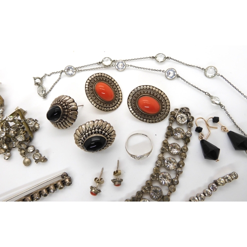 655 - A collection of silver and costume jewellery to include a pair of Art Deco earrings, diamante etc