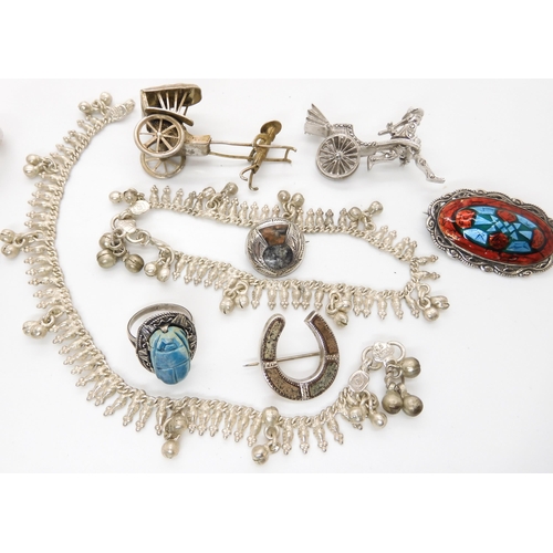 658 - Two white metal Rickshaw brooches, a Scottish silver thistle brooch and other items