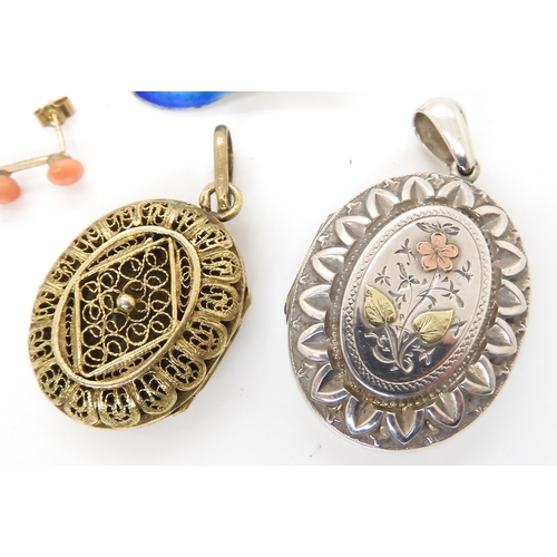 660 - A Russian silver button, Two white metal lockets one with hair panel under glazed panel, silver gilt... 