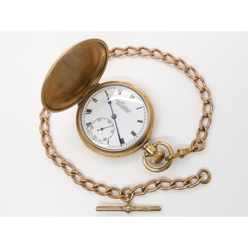 667 - A gold plated Everite pocket watch with a gold plated T&H fob chain