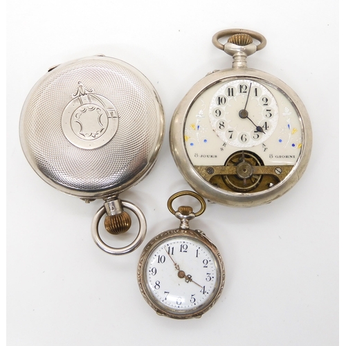 673 - Two continental silver cased pocket watches, and a further fob watch