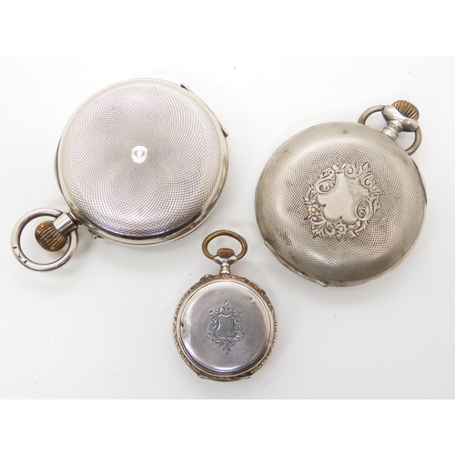 673 - Two continental silver cased pocket watches, and a further fob watch