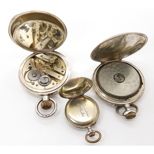 673 - Two continental silver cased pocket watches, and a further fob watch