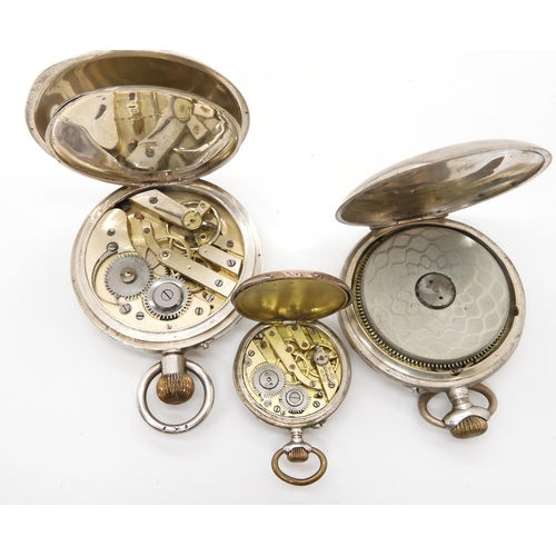 673 - Two continental silver cased pocket watches, and a further fob watch