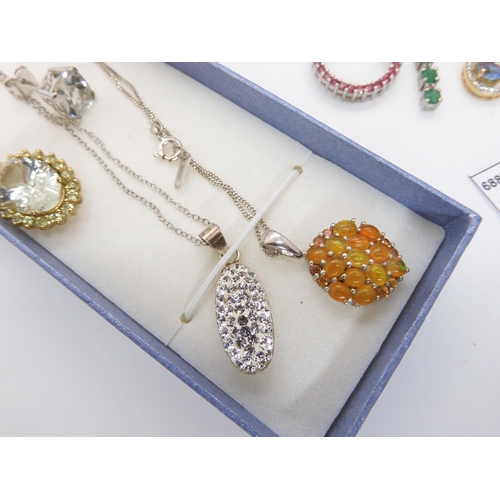 678 - A collection of silver Gems TV gem set jewellery to include fire opal , tanzanite and emerald some w... 