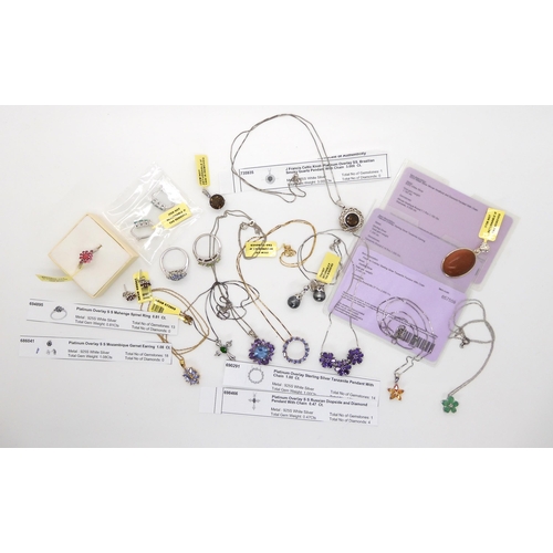 679 - A collection of silver Gems TV gem set jewellery to include pink spinel, tanzanite and a Russian dio... 