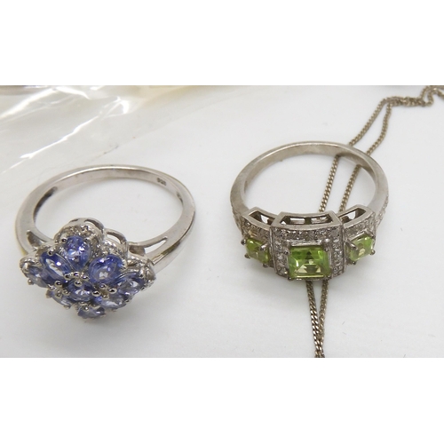 679 - A collection of silver Gems TV gem set jewellery to include pink spinel, tanzanite and a Russian dio... 