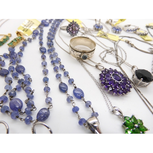 682 - A collection of silver Gems TV gem set jewellery to include, peridot necklace and earrings, tanzanit... 