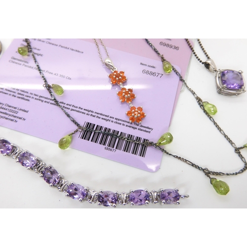 682 - A collection of silver Gems TV gem set jewellery to include, peridot necklace and earrings, tanzanit... 