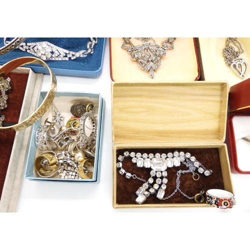 684 - An extensive silver charm bracelet, and a collection of silver and costume jewellery