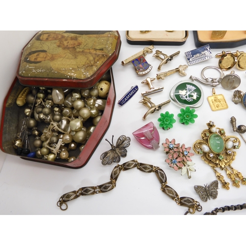 686 - A decorative white metal fob chain, and a collection of costume jewellery to include cufflinks and t... 