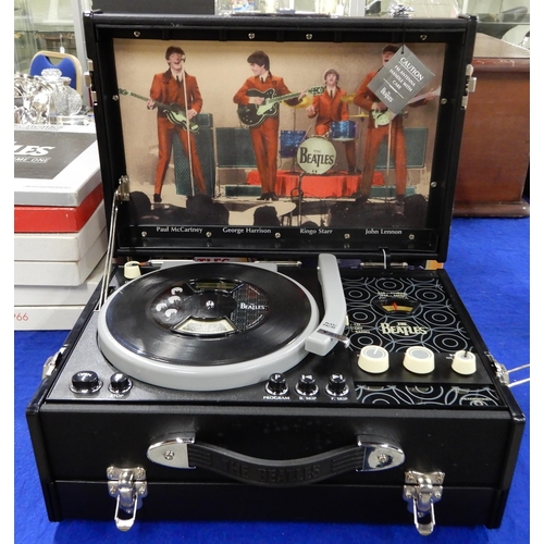 470 - A Beatles novelty compact disc player in the style of a suitcase record player together various comp... 