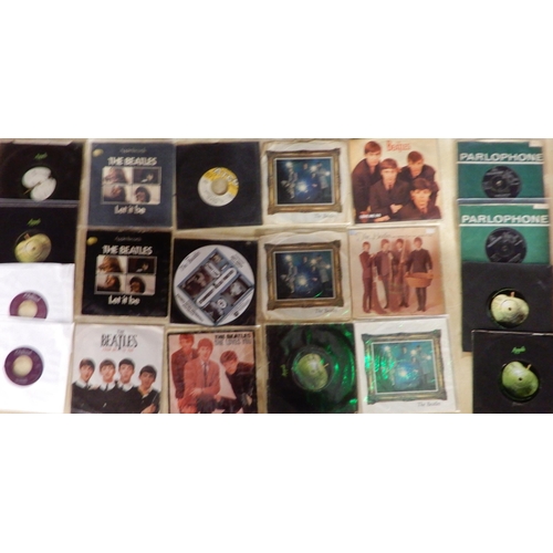 474 - A lot of The Beatles picture discs and for duke boxes only coloured vinyl records together with vari... 