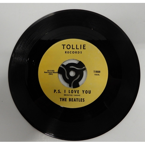 476 - A vinyl record copy of the Beatles hit single Love me Do (A-side) and P.S. I Love You (B-side) on To... 