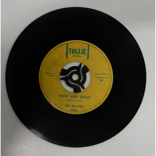 476 - A vinyl record copy of the Beatles hit single Love me Do (A-side) and P.S. I Love You (B-side) on To... 