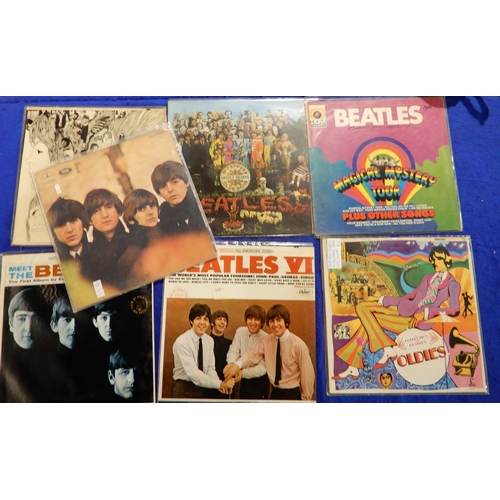492 - An extensive lot of The Beatles records with some multiple versions, to include the White Album, Bea... 