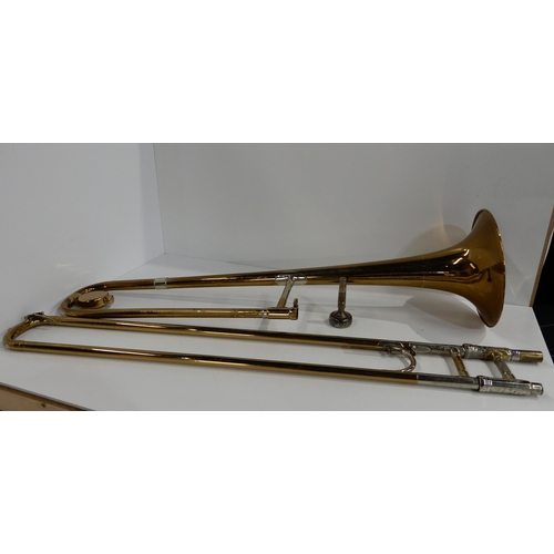 500 - An F E Olds and son trombone together with a T1 mouthpiece inscribed Al Cass Made in England and tro... 