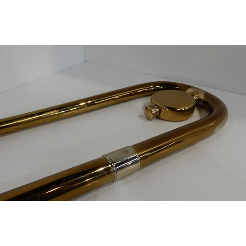 500 - An F E Olds and son trombone together with a T1 mouthpiece inscribed Al Cass Made in England and tro... 