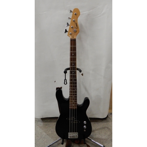 502 - An encore short scale electric bass guitar in black with a large case