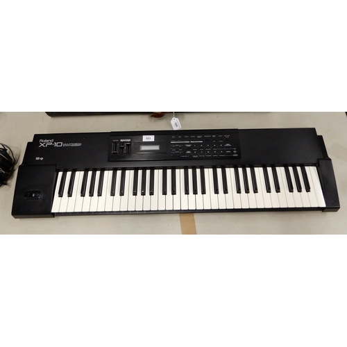 503 - A Roland XP12 electric piano keyboard with 61 keys