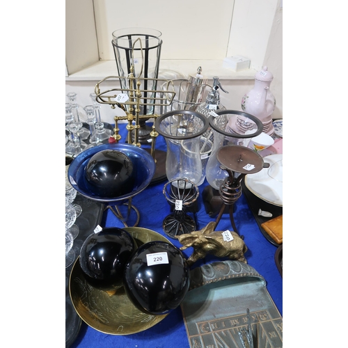 220 - A brass wine bottle stand on an oval wooden base, pair of glass and spelter vases, and another, a br... 