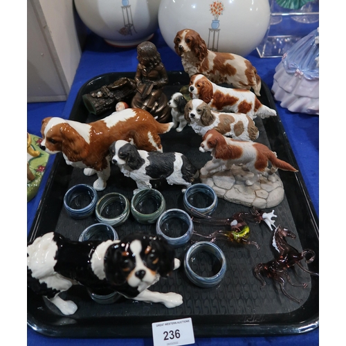 236 - A Royal Doulton spaniel, a Beswick spaniel, a Border Fine Arts resin spaniel, other resin spaniels, ... 