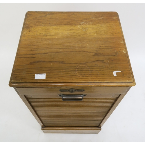 1 - An early 20th century oak tambour front filing cabinet, 92cm high x 45cm wide x 39cm