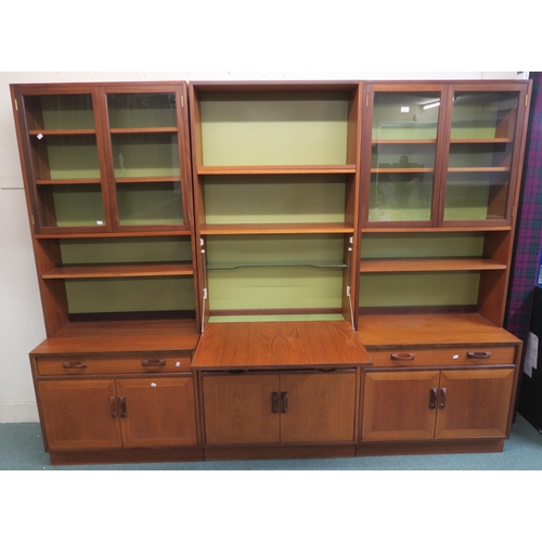 101 - A mid 20th century teak G Plan three section wall unit, 199cm high x 84cm wide x 47cm deep (per sect... 