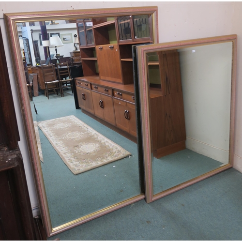 103 - A lot of two large contemporary bevelled glass wall mirrors, first is 100cm high x151cm wide and sec... 