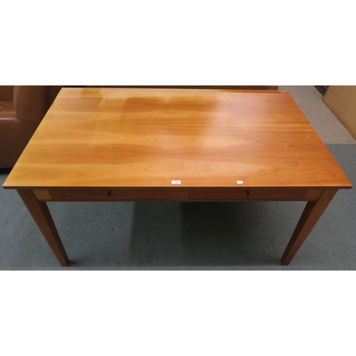 105 - A contemporary Danish cherrywood two drawer kitchen table, 76cm high x 151cm wide x 91cm deep