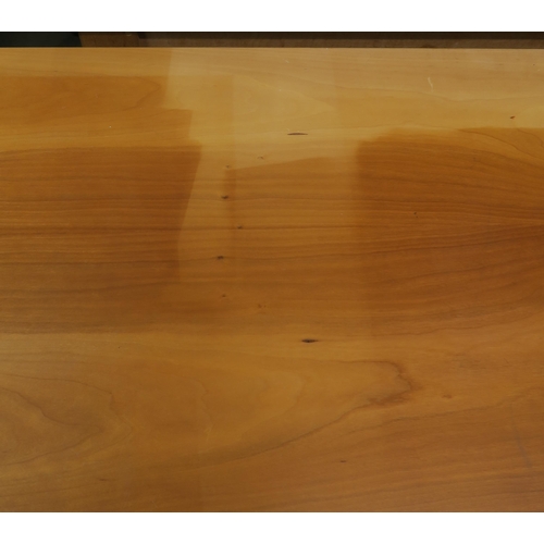 105 - A contemporary Danish cherrywood two drawer kitchen table, 76cm high x 151cm wide x 91cm deep