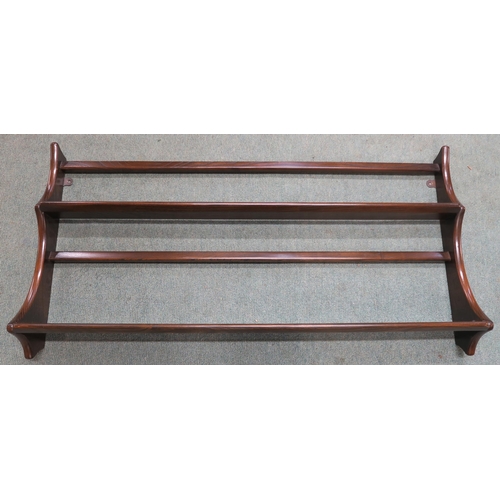 109 - A pair of 20th century elm and beech Ercol dining carvers and an Ercol plate rack (3)