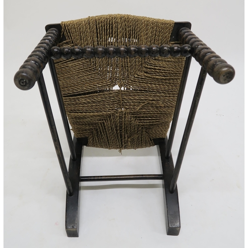 11 - A 19th century stained Bobbin turned child's chair with strung seat