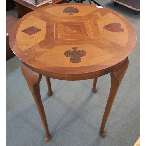 115 - A 20th century mahogany circular occasion table inlaid with card suits to top, 72cm high x 61cm diam... 