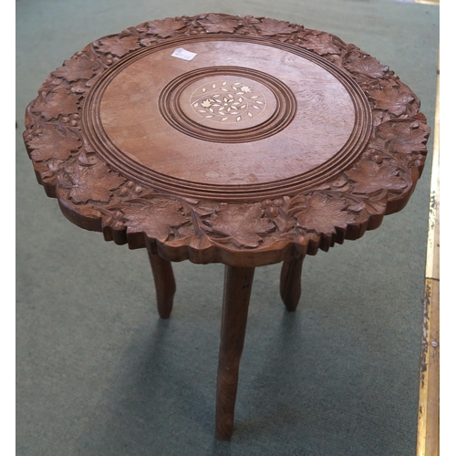 115 - A 20th century mahogany circular occasion table inlaid with card suits to top, 72cm high x 61cm diam... 