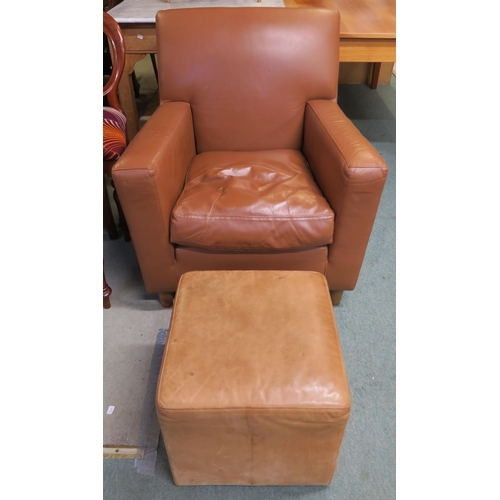 118 - A modern brown leather upholstered armchair, 87cm high x 81cm wide x 90cm deep and a similarly tan l... 