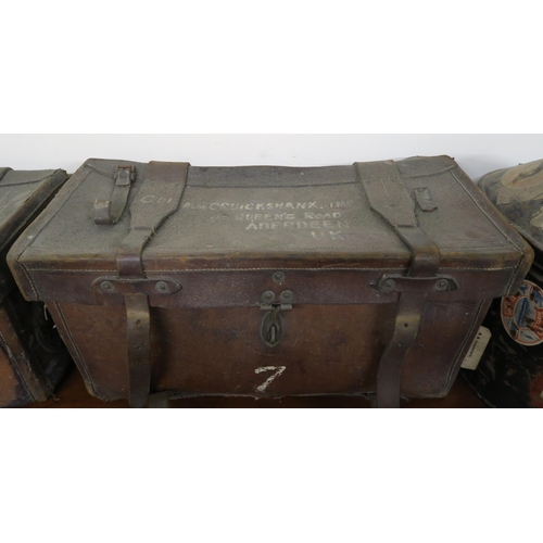 122 - A lot of two leather travel trunks and a metal hat box (3)