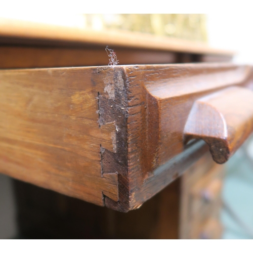 130 - An early 20th century oak pedestal desk, 77cm high x 136cm wide x 81cm deep