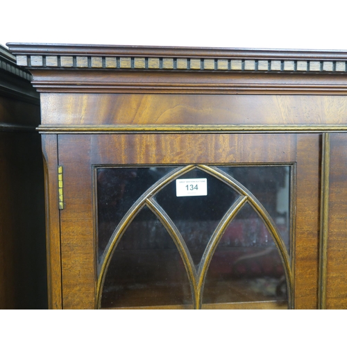 134 - A matched pair of 20th century mahogany glazed bookcases on three drawer chest bases, 176cm high x 7... 