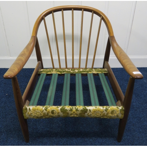 141 - A mid 20th century teak framed Greaves & Thomas stick back armchair, 72cm high x 70cm wide x 76c... 