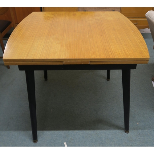 147 - A 20th century teak sideboard, 70cm high x 153cm wide x 44cm deep and a 20th century teak pull out d... 