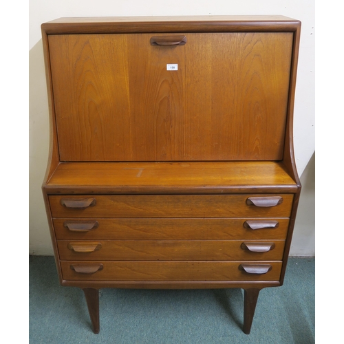 150 - A mid 20th century teak Younger four drawer writing bureau, 126cm high x 89cm wide x 47cm deep