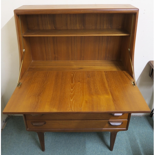 150 - A mid 20th century teak Younger four drawer writing bureau, 126cm high x 89cm wide x 47cm deep